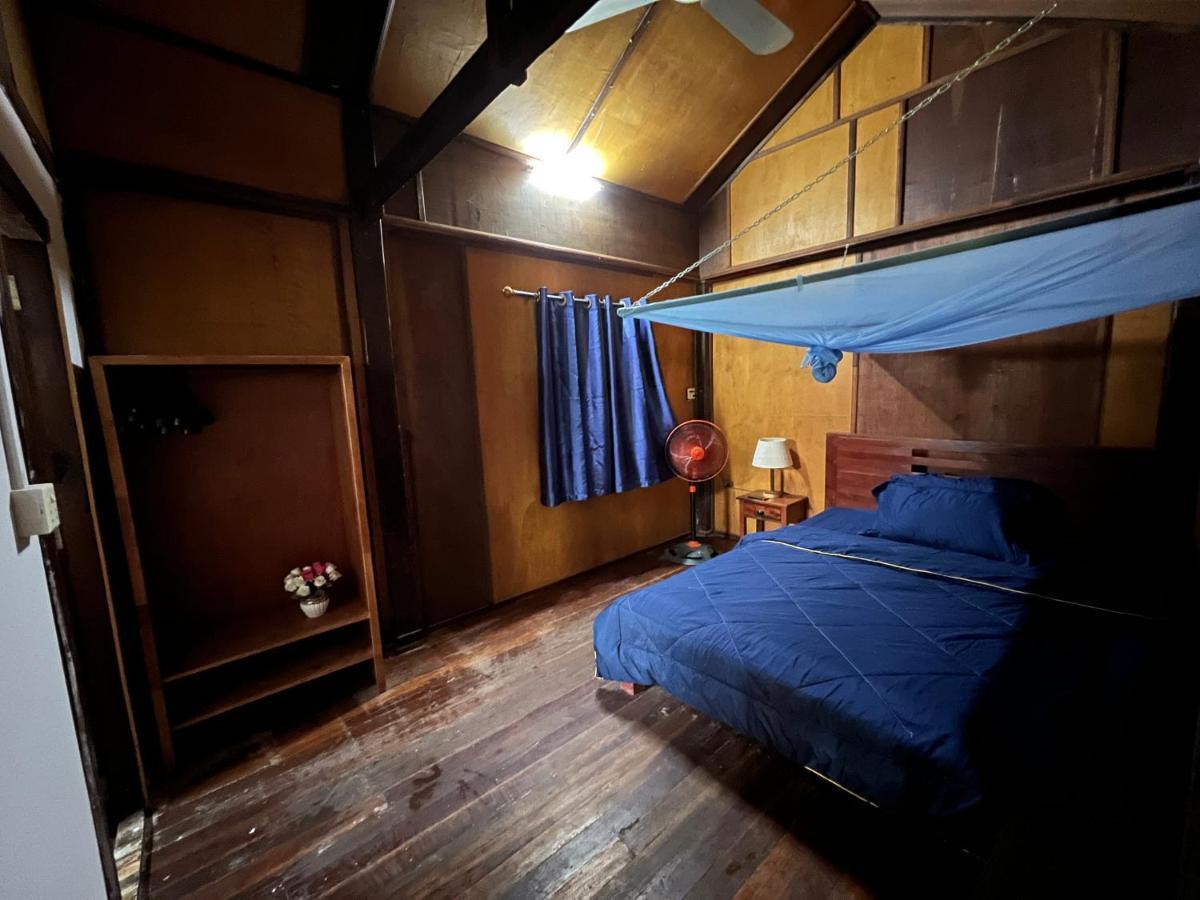 Habitación en casa particular Yi Family