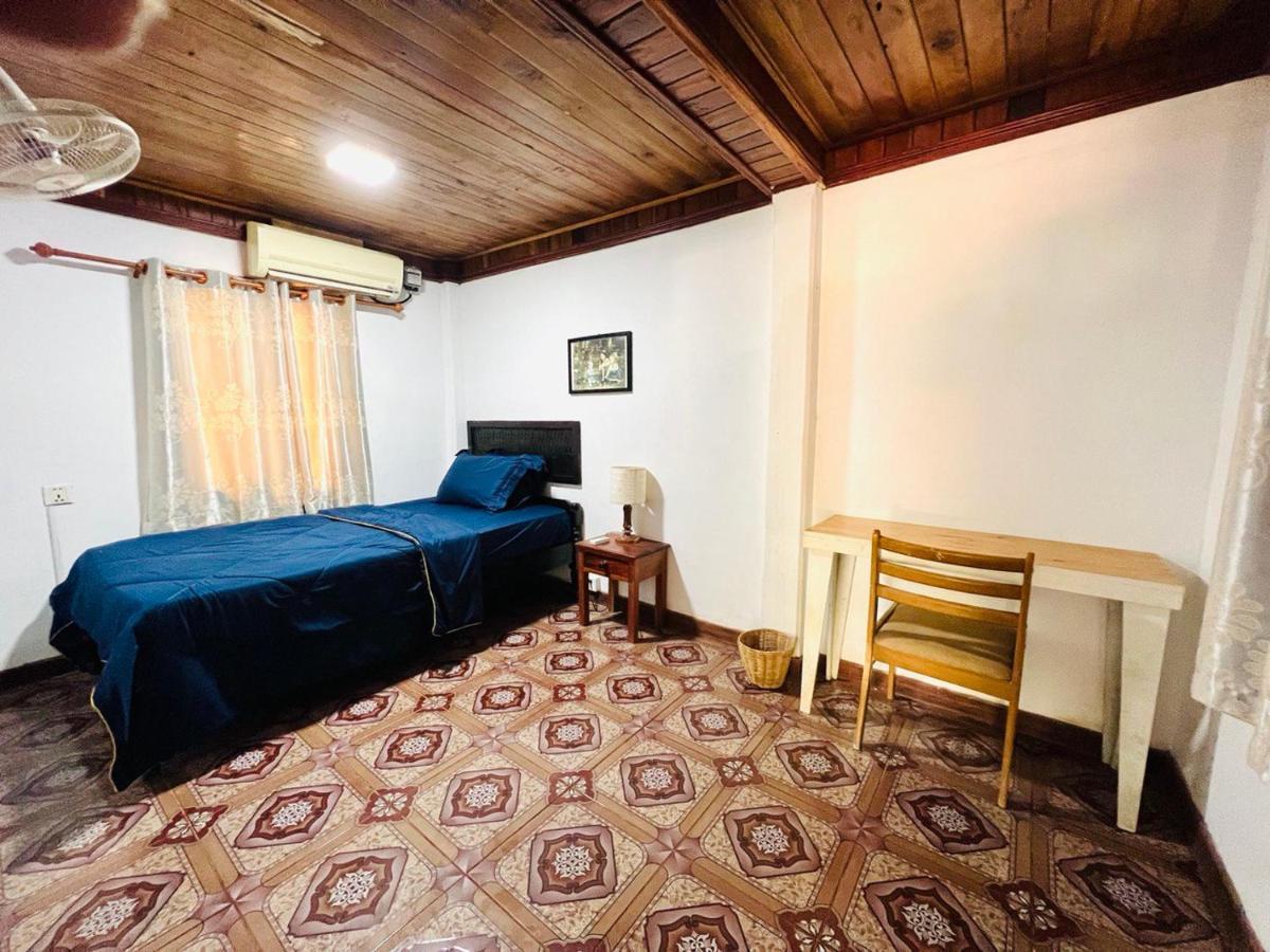 Habitación en casa particular Yi Family